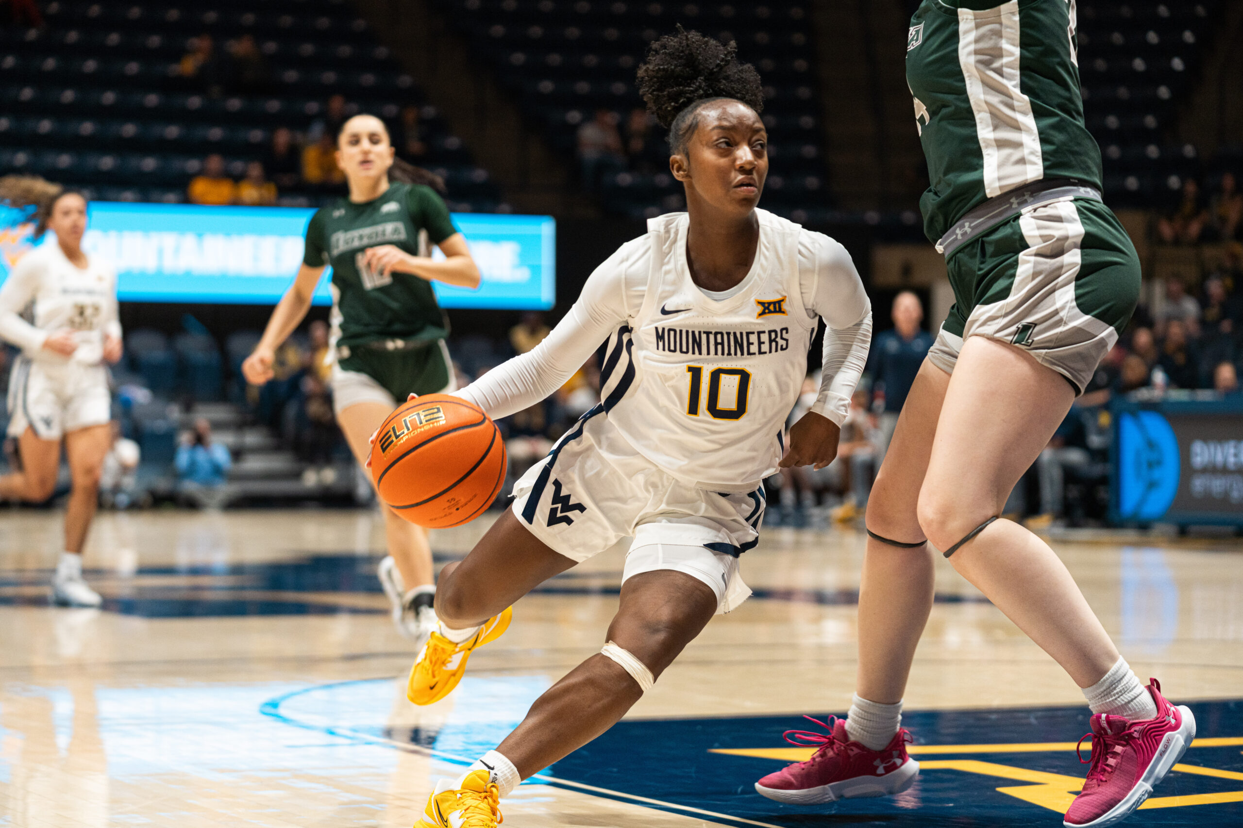 Quinerly, Harrison team up to give Mark Kellogg his first win at WVU